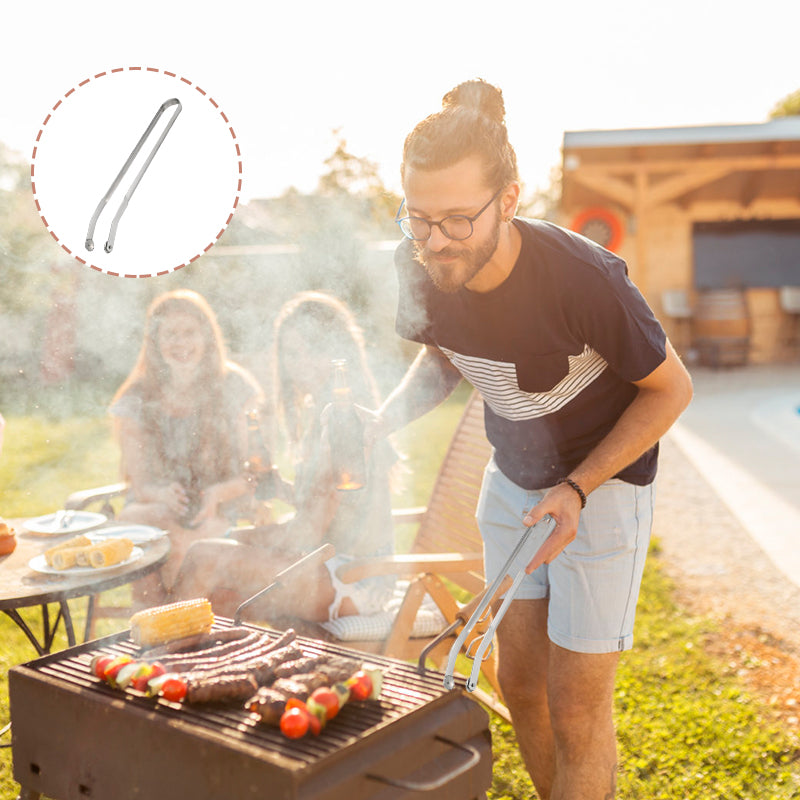 Zange zum Wenden von BBQ-Würstchen